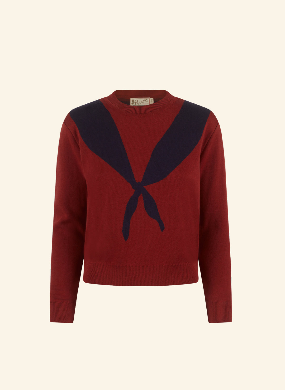 A cropped crewneck sweater in deep red with a large dark navy blue scarf motif across the chest, displayed on a solid cream background.