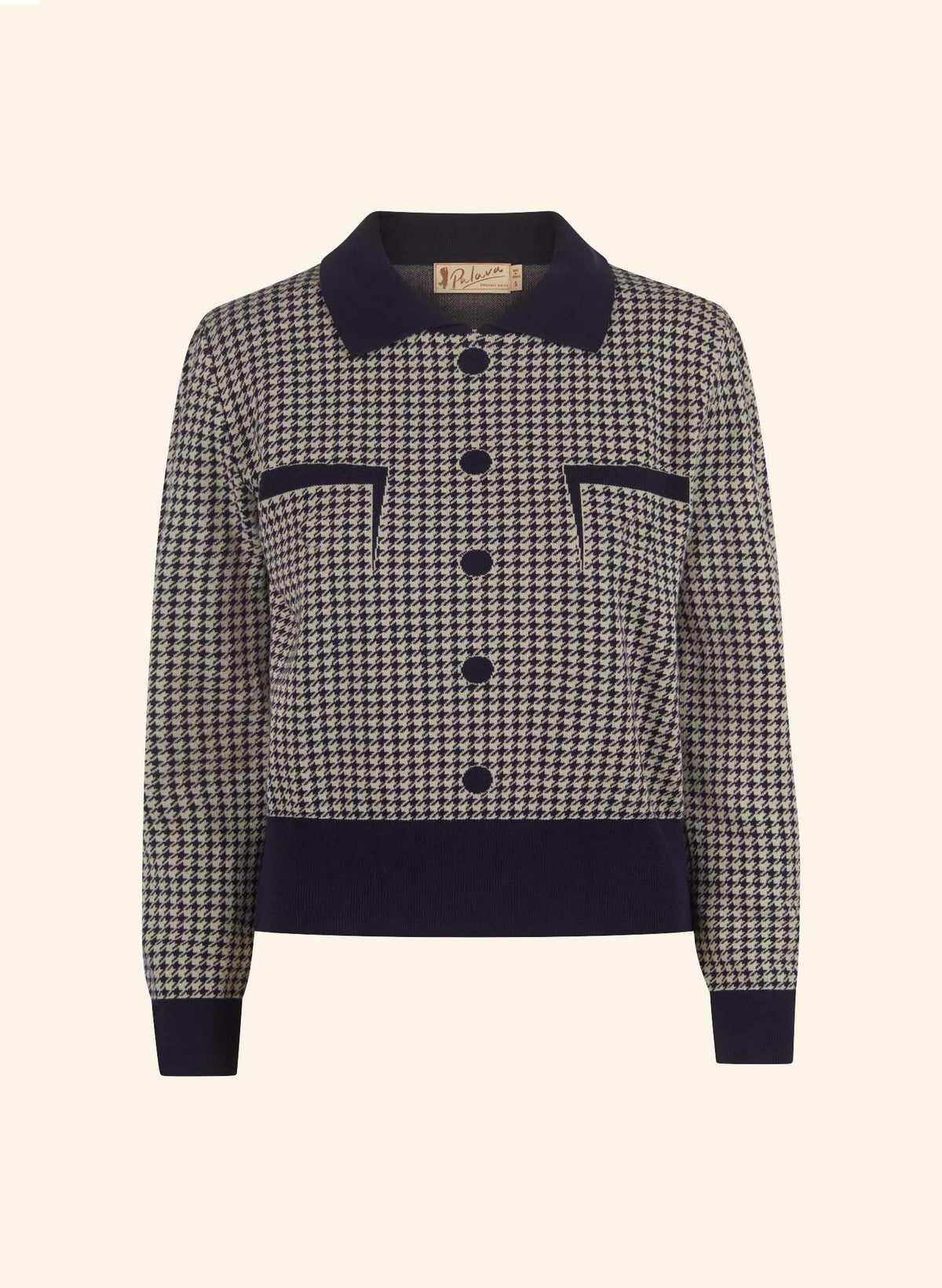 A women's navy and beige houndstooth jacket with dark navy blue trim on the collar, cuffs, hem, and button details, shown against a solid cream background.