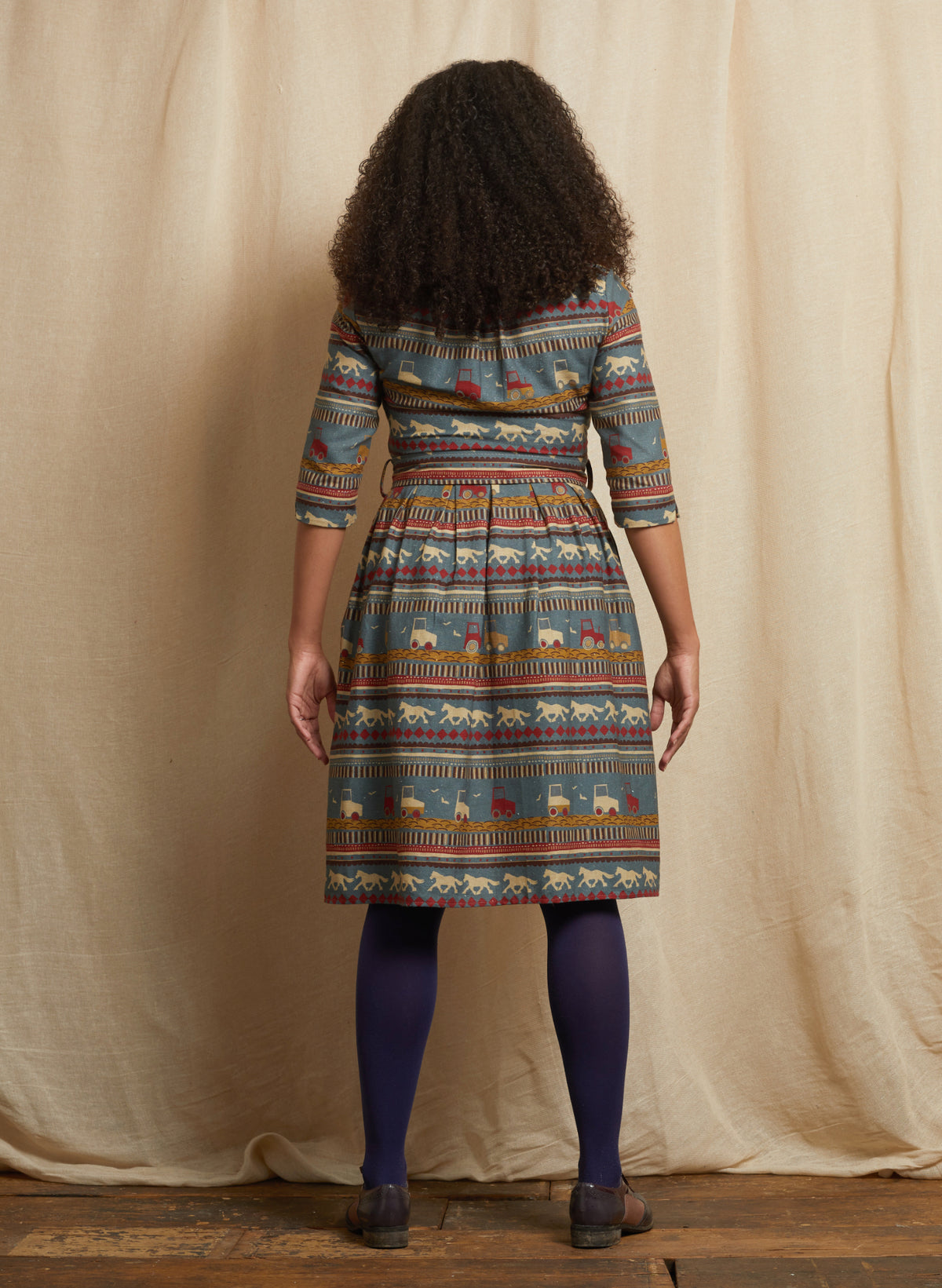 Cynthia - Teal Spinning Horses Dress