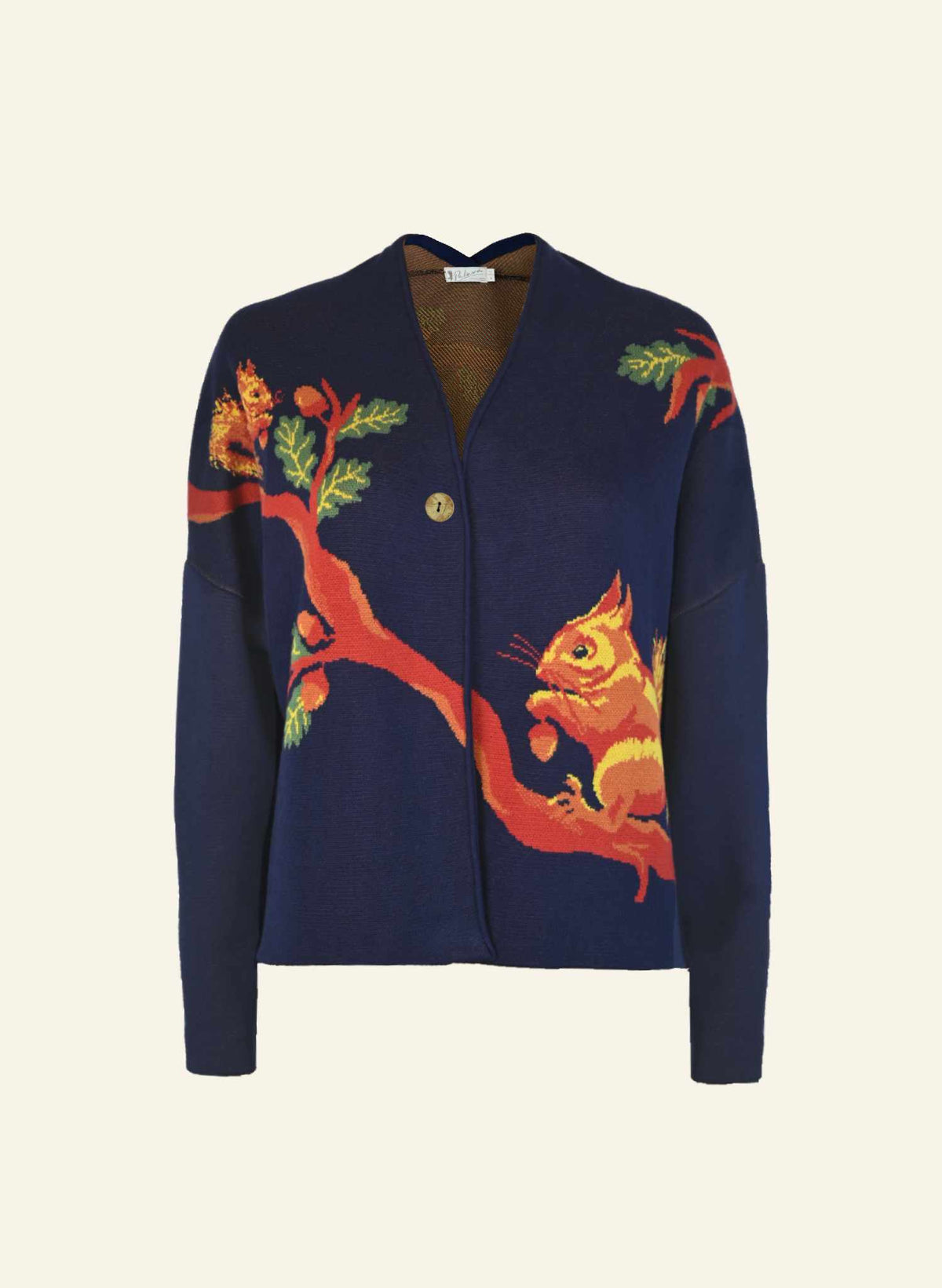 Navy blue organic cotton cardigan for women with colorful squirrel design on a beige background