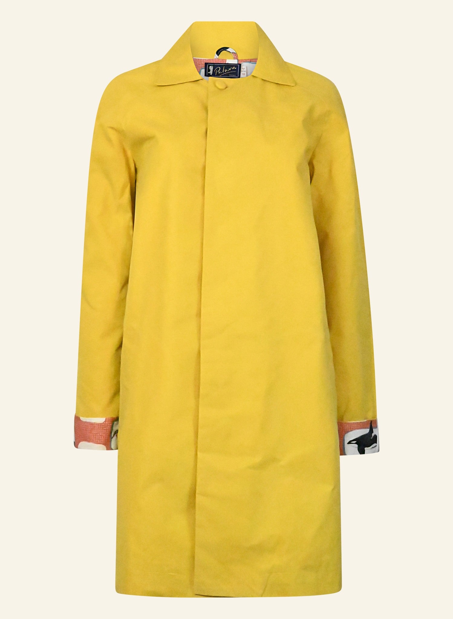 A yellow trench coat for women with a red check lining, collar, and cuffs, displayed against a plain background.
