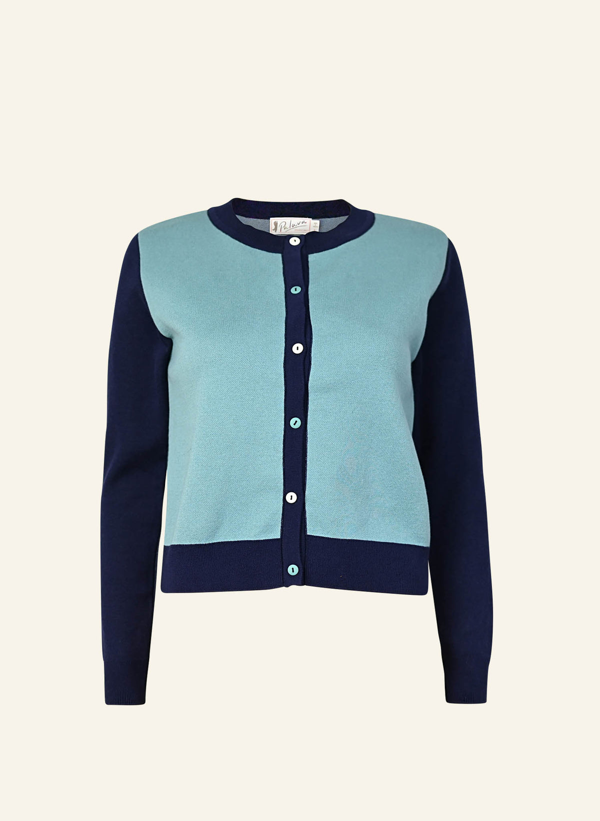 A flatshot image of a teal and navy cardigan in a classic vintage style. with teal and white alternating buttons down the front. 