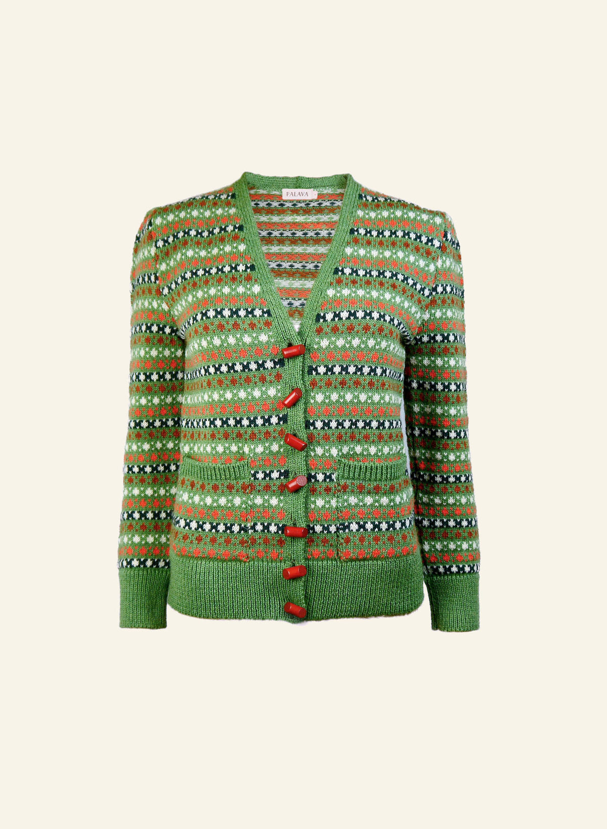 A green Heritage cardigan made from 100% British wool with popcorn knit pattern and red lipstick buttons.